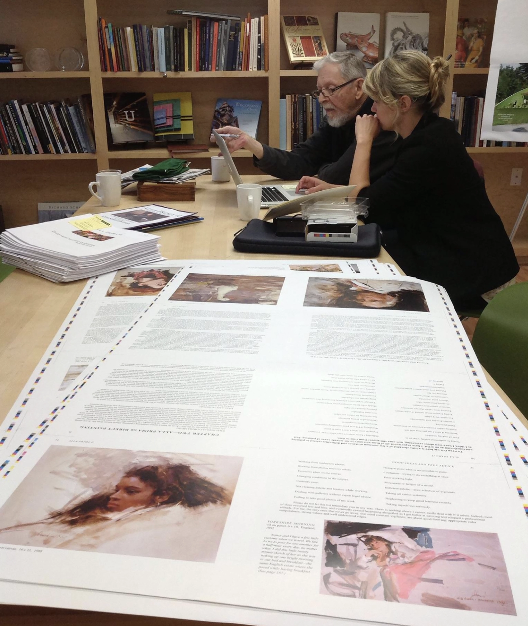 Richard and Katie reviewing the press proofs for APII.